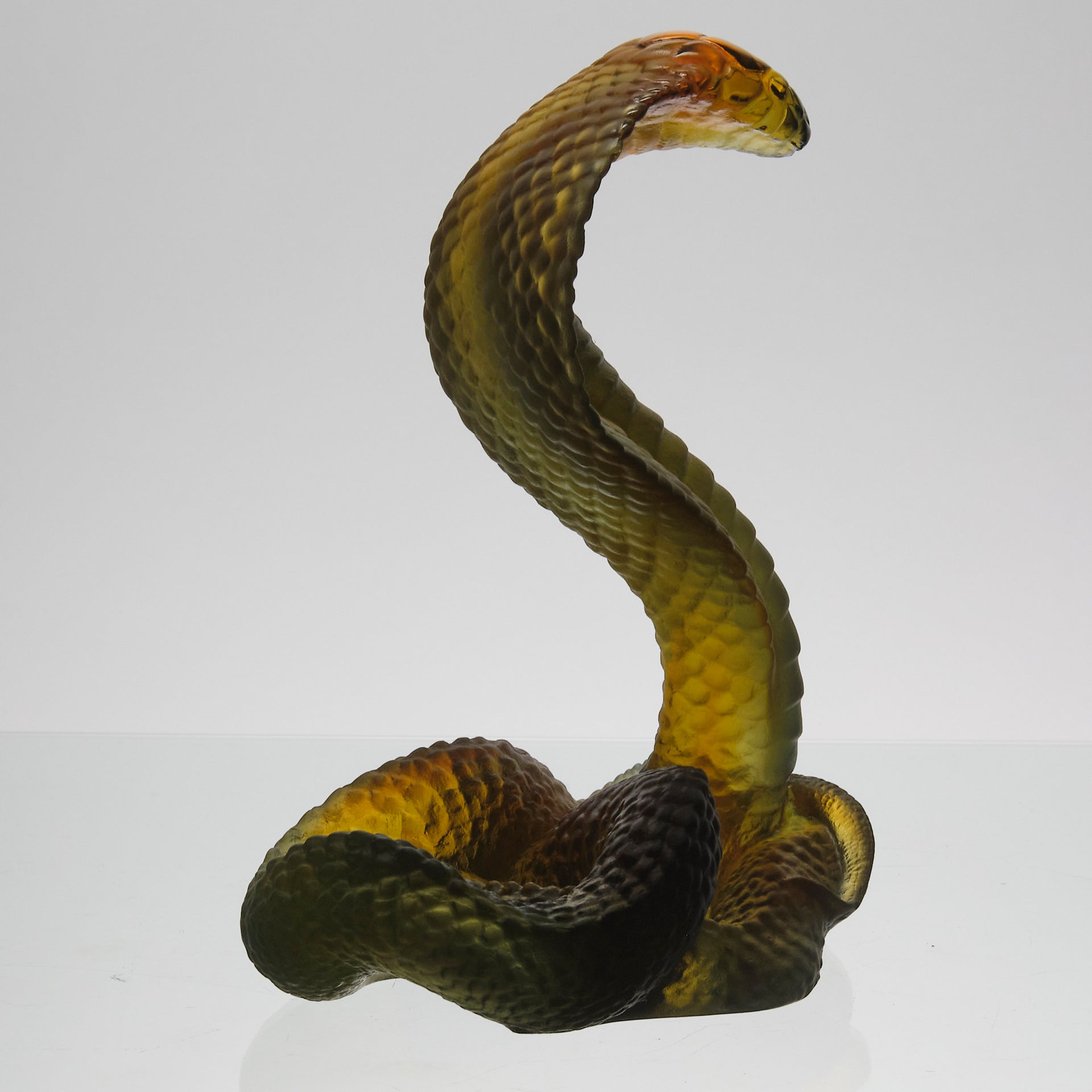 Rearing Cobra by Daum Glass a limited edition French glass figure of a rearing cobra. The striking pate-de-verre model in naturalistic variegated green colour 