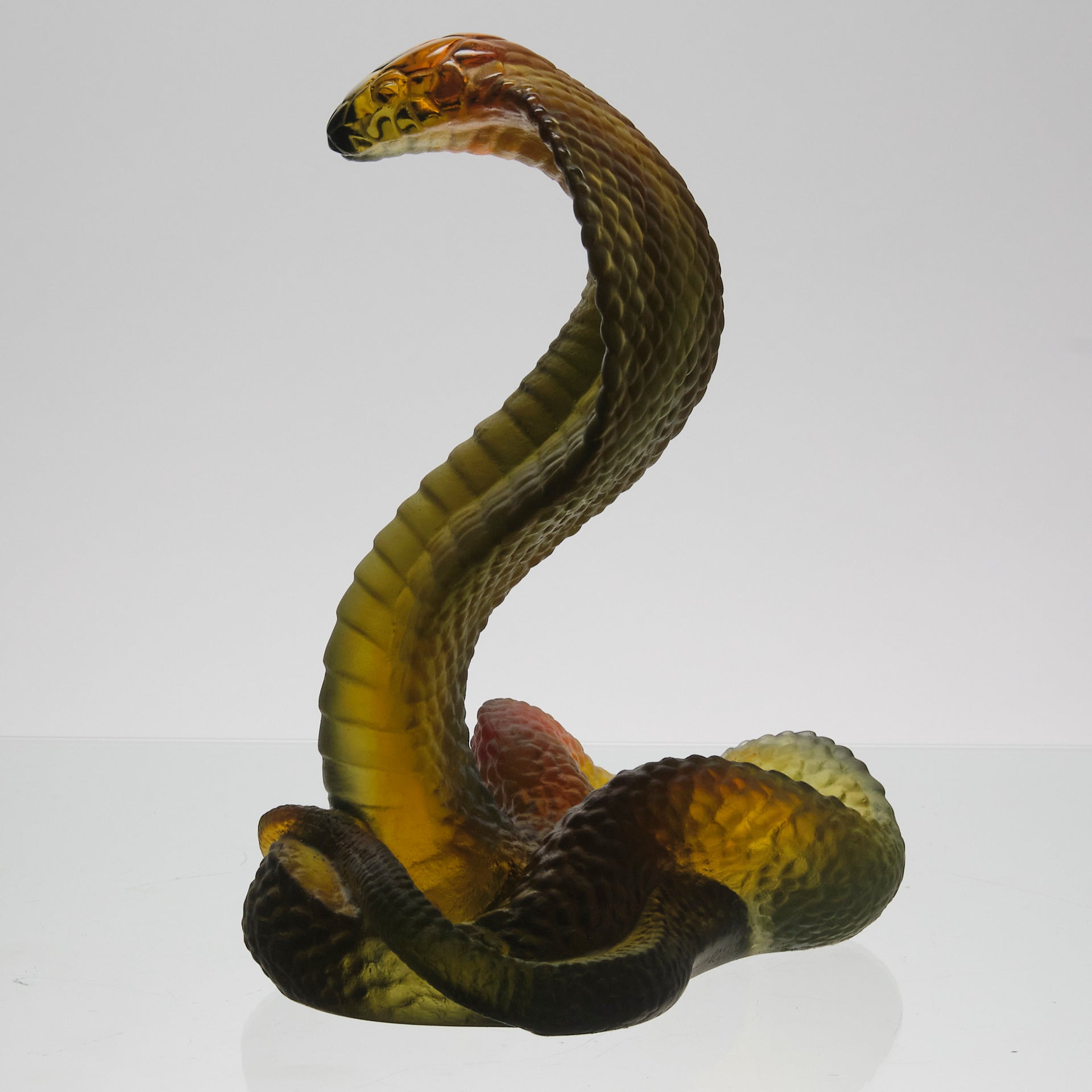 Rearing Cobra by Daum Glass a limited edition French glass figure of a rearing cobra. The striking pate-de-verre model in naturalistic variegated green colour 