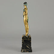 Alexandrian Dancer by Demetre Chiparus A fabulous Art Deco gilt bronze figure of a beautiful Egyptian dancer in full dance costume with her arms held by her sides, hand finished in stunning gilded and cold painted enamel colour, raised on a portoro marble base
