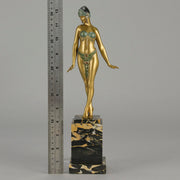Alexandrian Dancer by Demetre Chiparus A fabulous Art Deco gilt bronze figure of a beautiful Egyptian dancer in full dance costume with her arms held by her sides, hand finished in stunning gilded and cold painted enamel colour, raised on a portoro marble base