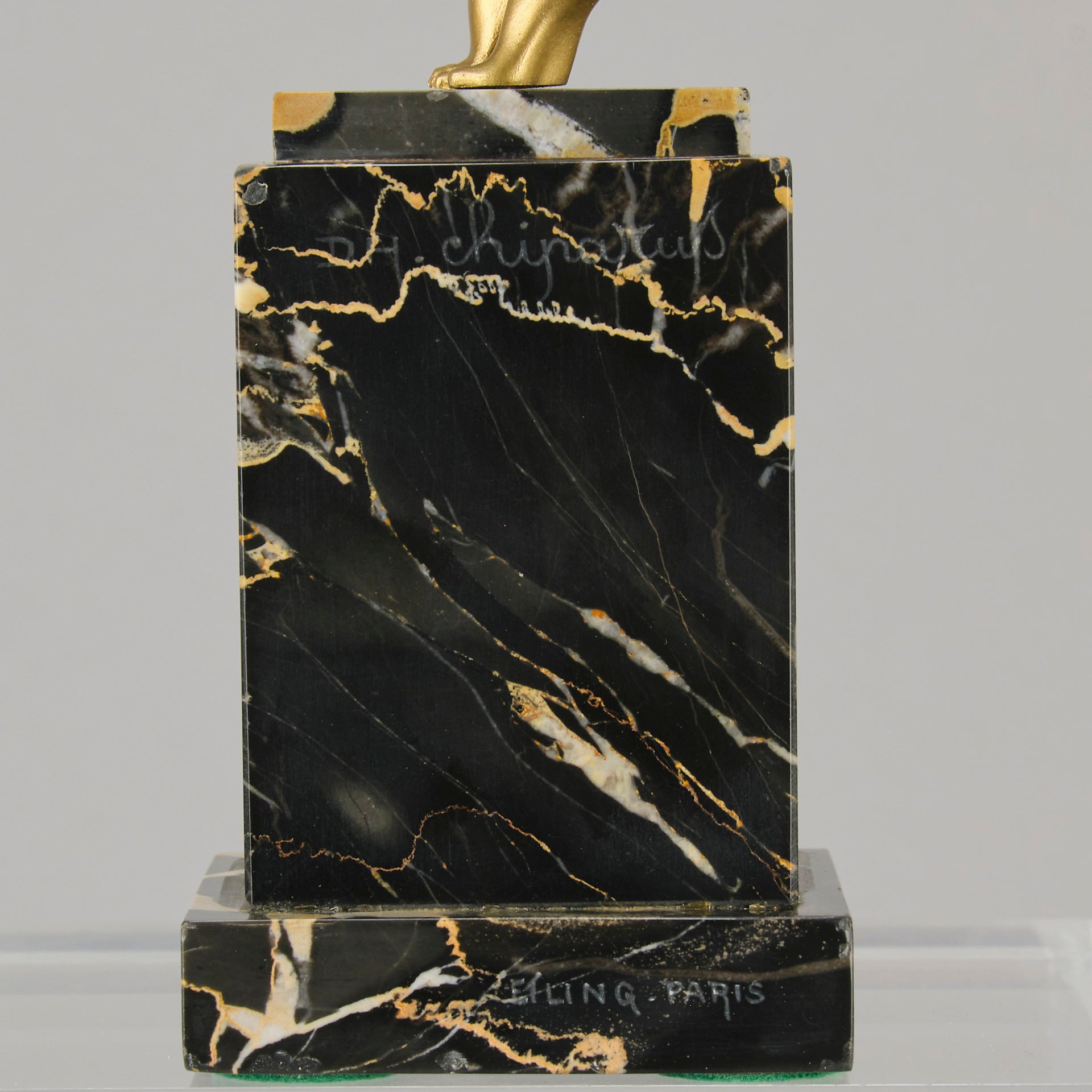 Alexandrian Dancer by Demetre Chiparus A fabulous Art Deco gilt bronze figure of a beautiful Egyptian dancer in full dance costume with her arms held by her sides, hand finished in stunning gilded and cold painted enamel colour, raised on a portoro marble base