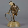 Bronze and ivory boy with hoop by Chiparus