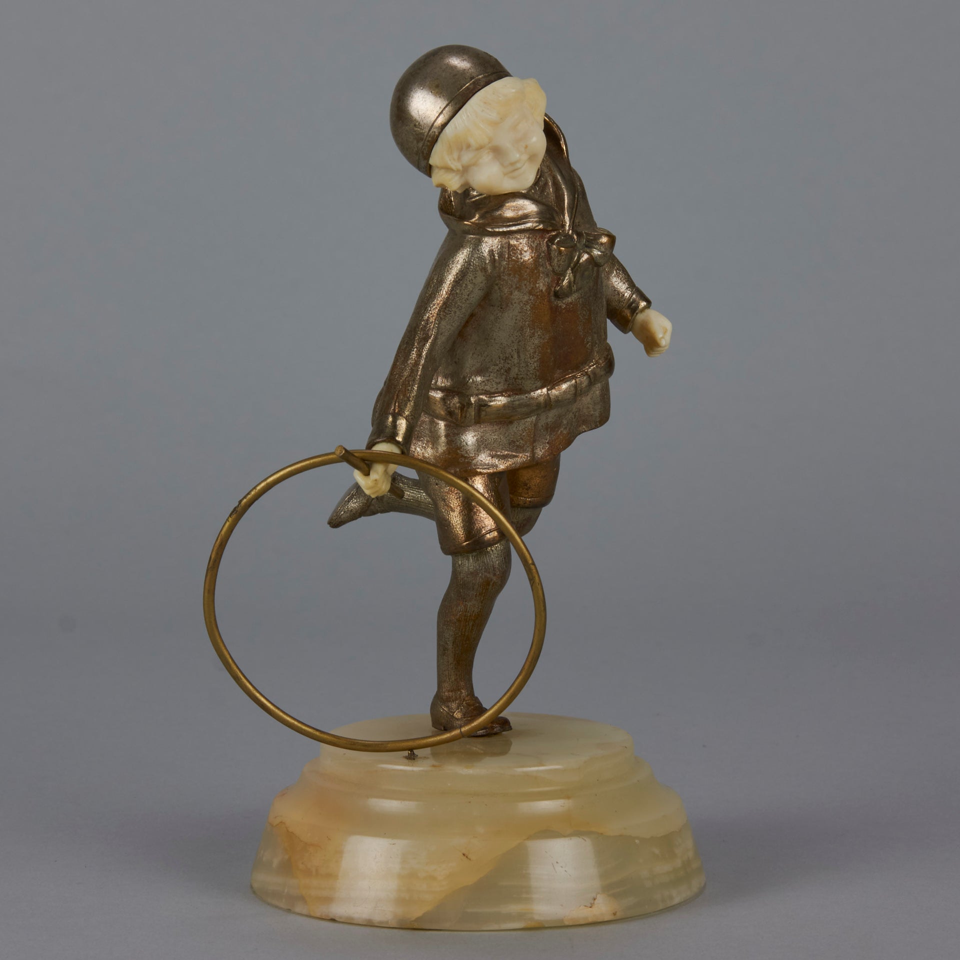 Bronze and ivory boy with hoop by Chiparus