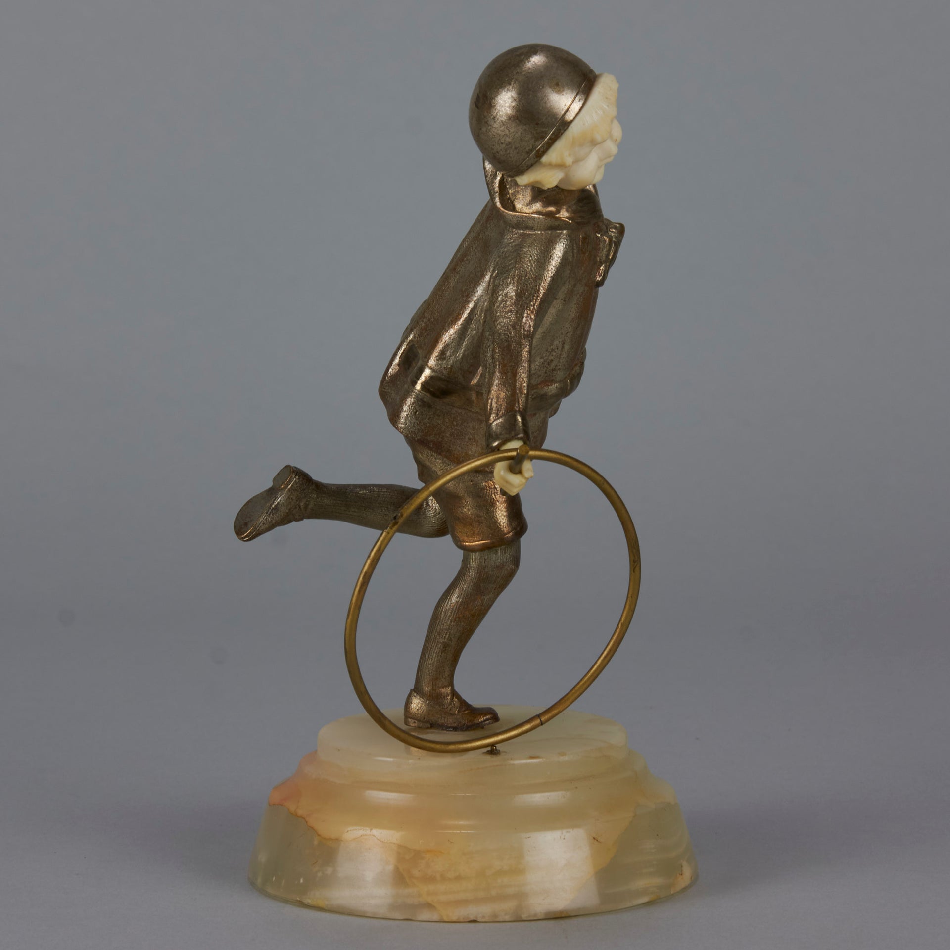 Bronze and ivory boy with hoop by Chiparus