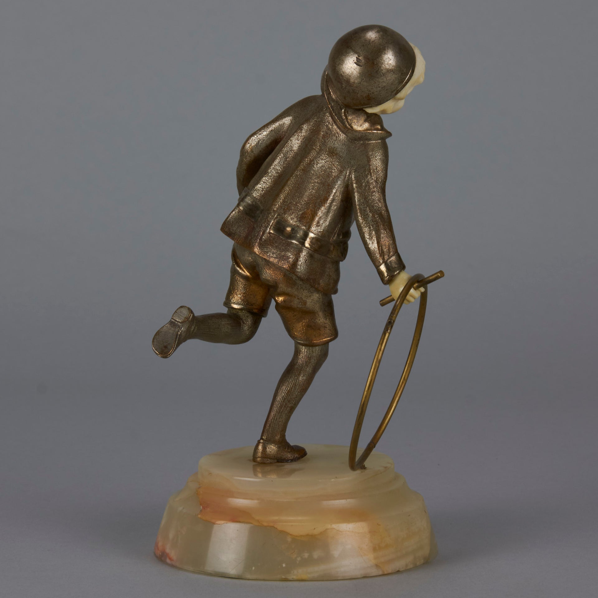 Bronze and ivory boy with hoop by Chiparus
