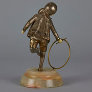 Bronze and ivory boy with hoop by Chiparus