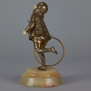 Bronze and ivory boy with hoop by Chiparus