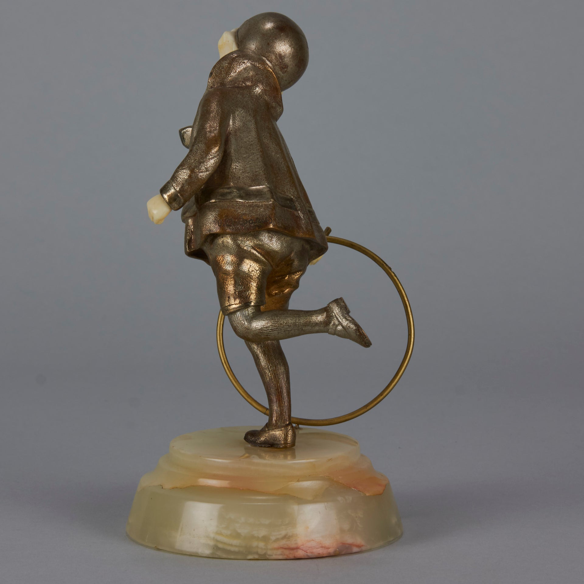 Bronze and ivory boy with hoop by Chiparus