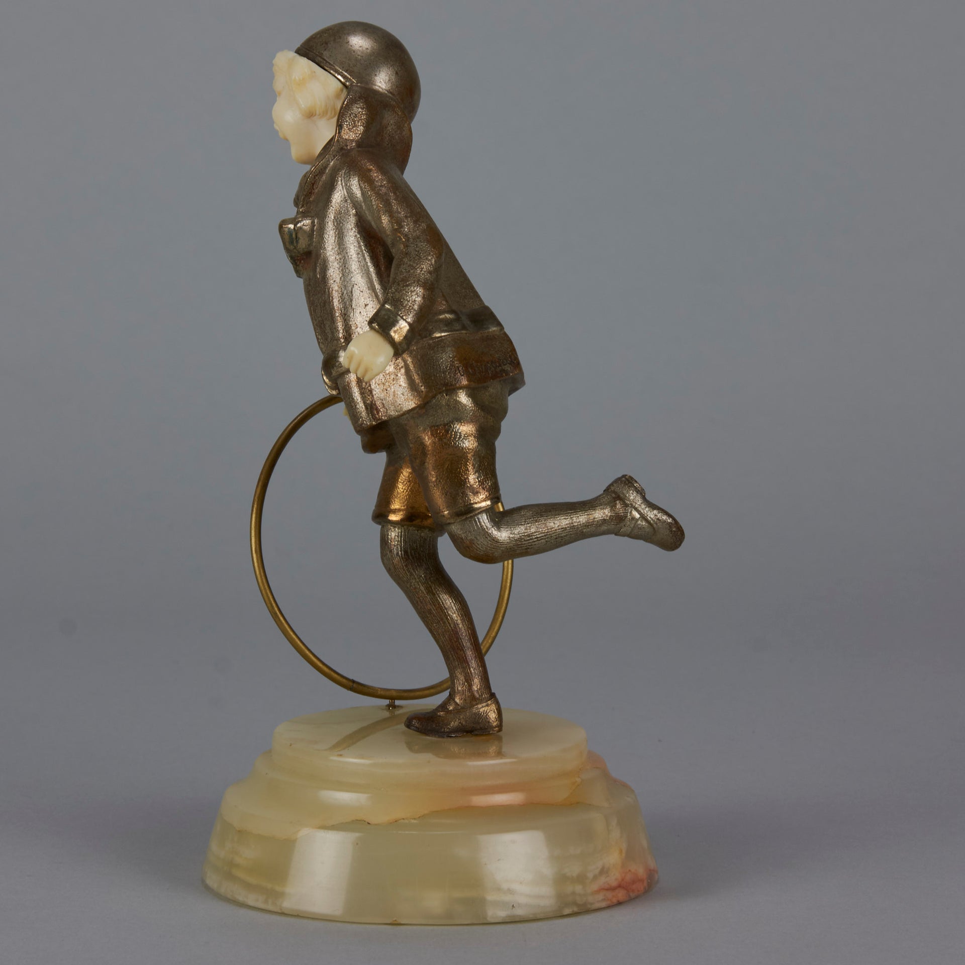 Bronze and ivory boy with hoop by Chiparus