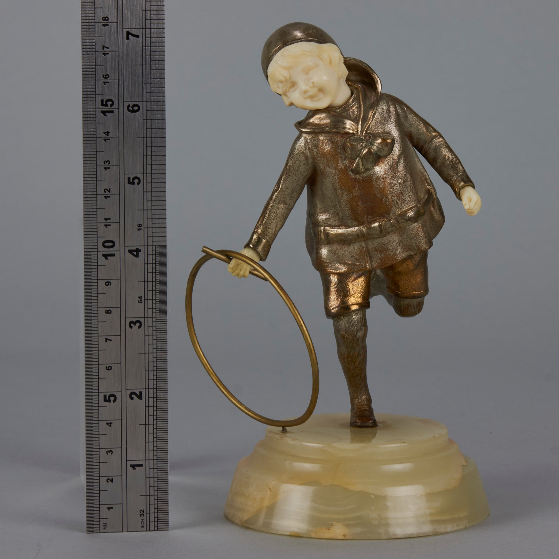 Bronze and ivory boy with hoop by Chiparus