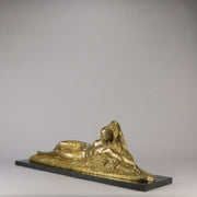 Été by Demetre Chiparus a fabulous Art Deco cold painted gilt and silver bronze figure of a beautiful young woman reclining on a bed of wheat sheaves
