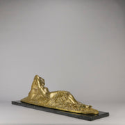 Été by Demetre Chiparus a fabulous Art Deco cold painted gilt and silver bronze figure of a beautiful young woman reclining on a bed of wheat sheaves