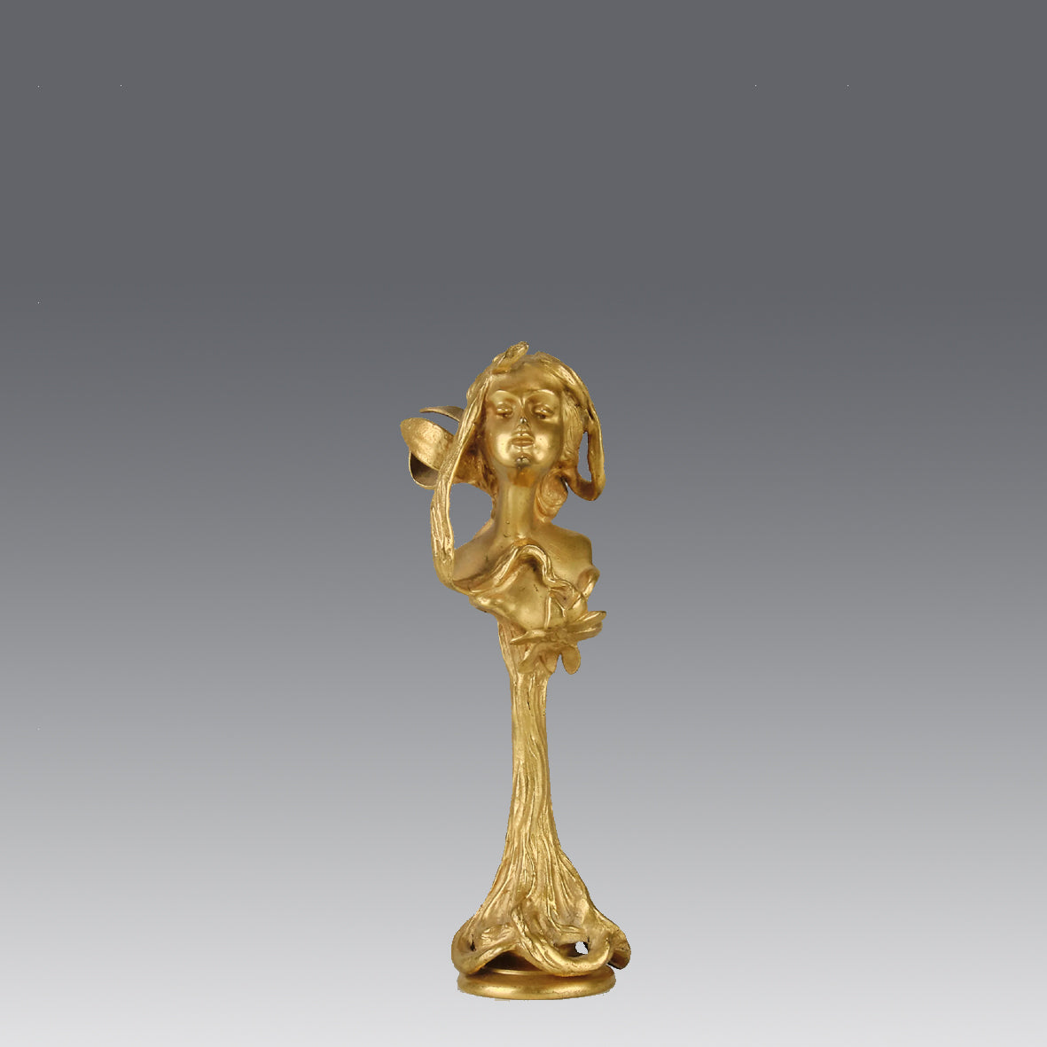 Art Nouveau Desk Seal a very fine early 20th Century French gilt bronze desk seal modelled as the head and shoulders of an Art Nouveau maiden with organic theme decorated with flowers