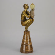 Oblivion by Georges Ducernet - Art Deco Statue 1930s a cold painted bronze figure of a dancer in a crouched pose holding a lidded urn. Exhibiting excellent colour and detail, raised on a conical marble plinth 