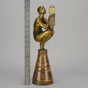Oblivion by Georges Ducernet - Art Deco Statue 1930s a cold painted bronze figure of a dancer in a crouched pose holding a lidded urn. Exhibiting excellent colour and detail, raised on a conical marble plinth 