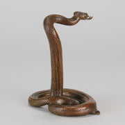 Rearing Snake an early 20th Century Art Deco bronze study of a rearing snake, its tail curled and head raised in an alert position by Edgar Brandt 