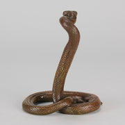 Rearing Snake an early 20th Century Art Deco bronze study of a rearing snake, its tail curled and head raised in an alert position by Edgar Brandt 