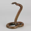 Rearing Snake an early 20th Century Art Deco bronze study of a rearing snake, its tail curled and head raised in an alert position by Edgar Brandt 