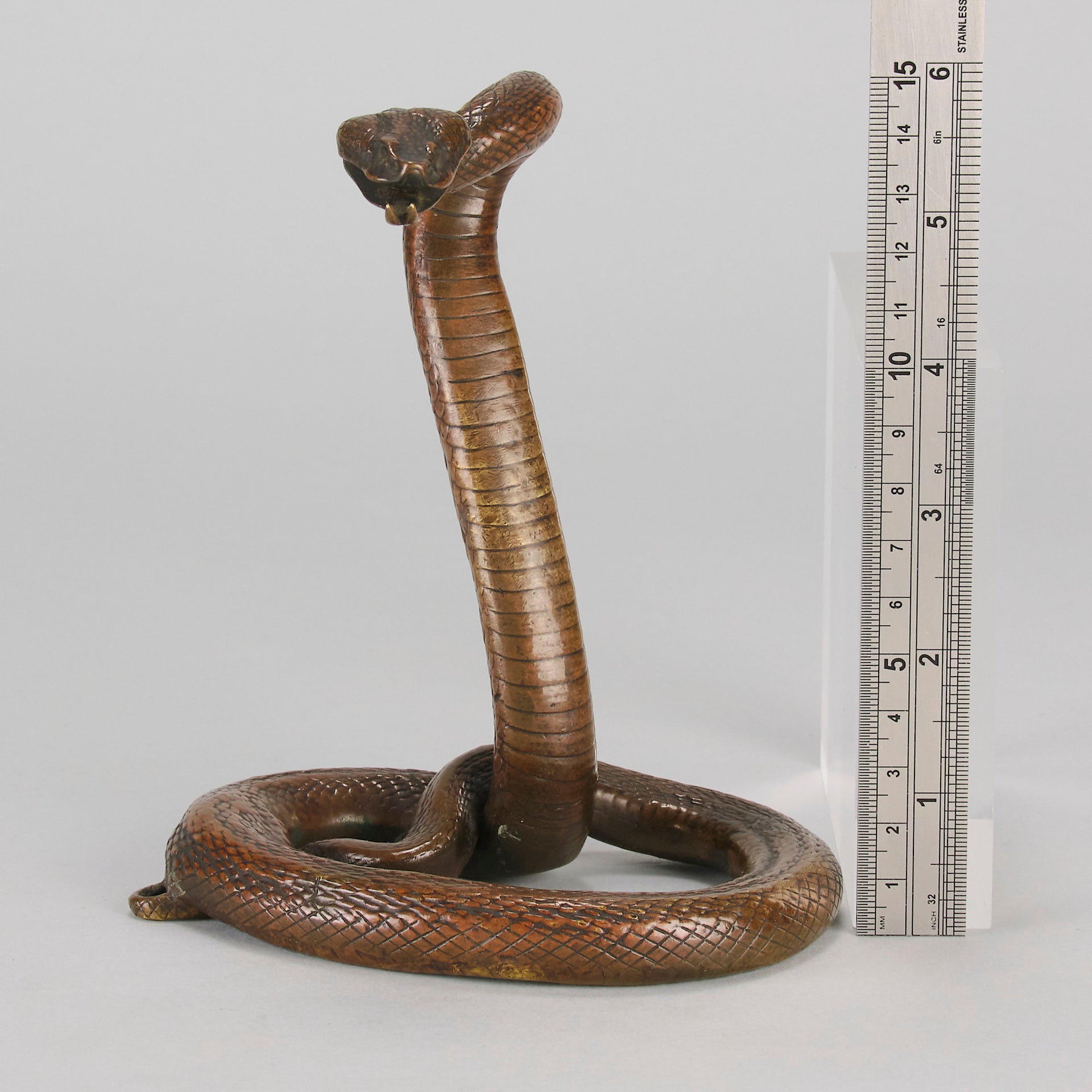 Rearing Snake an early 20th Century Art Deco bronze study of a rearing snake, its tail curled and head raised in an alert position by Edgar Brandt 