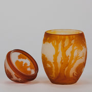 Easter  Egg Vase with Bunny by Émile Gallé. A beautiful and very rare early 20th Century cameo glass lidded egg shaped vase acid cut and etched with an Easter bunny sitting on a nest of eggs under the boughs of some trees in deep orange on a cream/ivory field