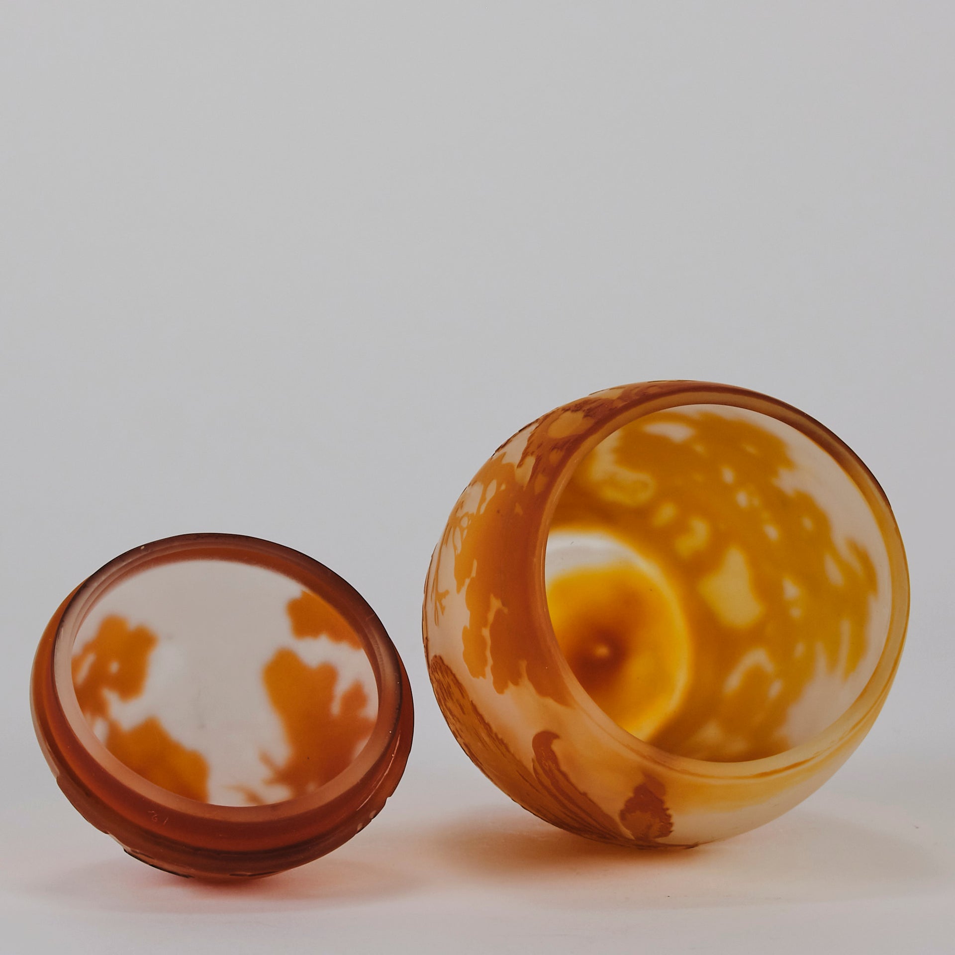 Easter  Egg Vase with Bunny by Émile Gallé. A beautiful and very rare early 20th Century cameo glass lidded egg shaped vase acid cut and etched with an Easter bunny sitting on a nest of eggs under the boughs of some trees in deep orange on a cream/ivory field