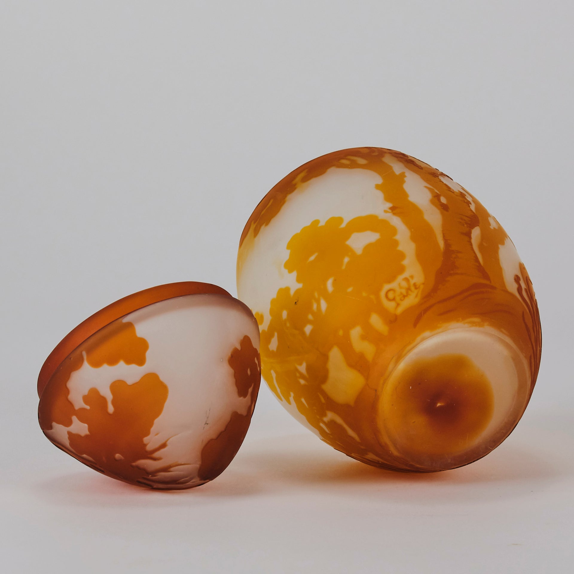 Easter  Egg Vase with Bunny by Émile Gallé. A beautiful and very rare early 20th Century cameo glass lidded egg shaped vase acid cut and etched with an Easter bunny sitting on a nest of eggs under the boughs of some trees in deep orange on a cream/ivory field