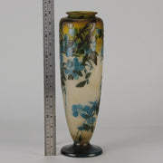 Art Nouveau Glass Vase Fruiting Sloe Berries by Emile Gallé An early 20th Century cameo glass vase acid cut and etched with a fruiting tree branch blooming with electric blue sloe berries against a pale cream/yellow background