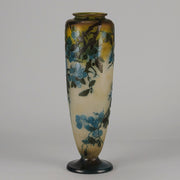 Art Nouveau Glass Vase Fruiting Sloe Berries by Emile Gallé An early 20th Century cameo glass vase acid cut and etched with a fruiting tree branch blooming with electric blue sloe berries against a pale cream/yellow background