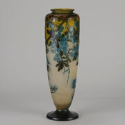Art Nouveau Glass Vase Fruiting Sloe Berries by Emile Gallé An early 20th Century cameo glass vase acid cut and etched with a fruiting tree branch blooming with electric blue sloe berries against a pale cream/yellow background
