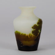 Green Landscape Vase by Emile Gallé An excellent late 19th Century cameo glass vase decorated with a deep green and burgundy landscape against a white field with fabulous detail and colour