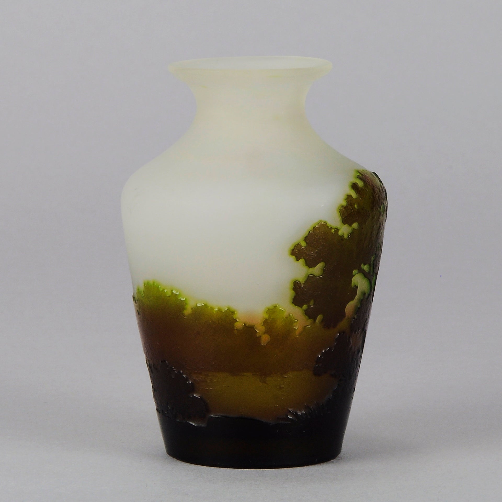 Green Landscape Vase by Emile Gallé An excellent late 19th Century cameo glass vase decorated with a deep green and burgundy landscape against a white field with fabulous detail and colour