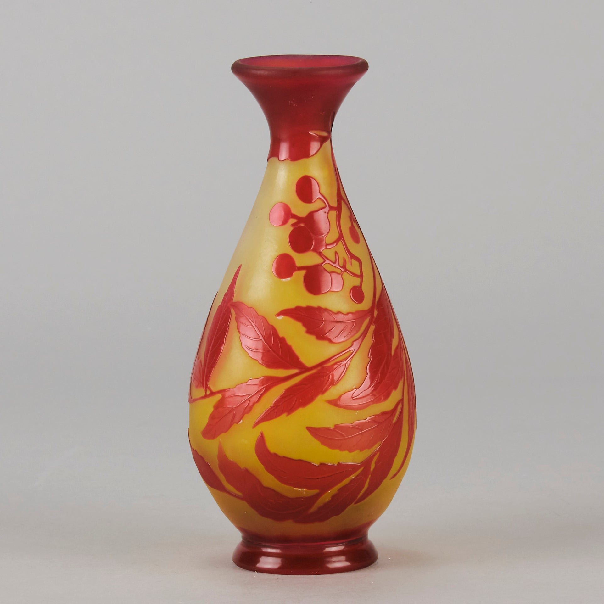 Art Nouveau Glass Vase Red Floral Cabinet Vase by Émile Gallé A beautiful early 20th Century cameo glass vase acid cut and etched with a bright red floral decoration against a warm orange background