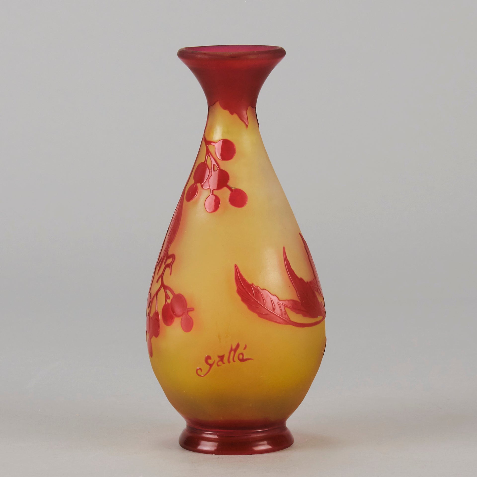 Art Nouveau Glass Vase Red Floral Cabinet Vase by Émile Gallé A beautiful early 20th Century cameo glass vase acid cut and etched with a bright red floral decoration against a warm orange background