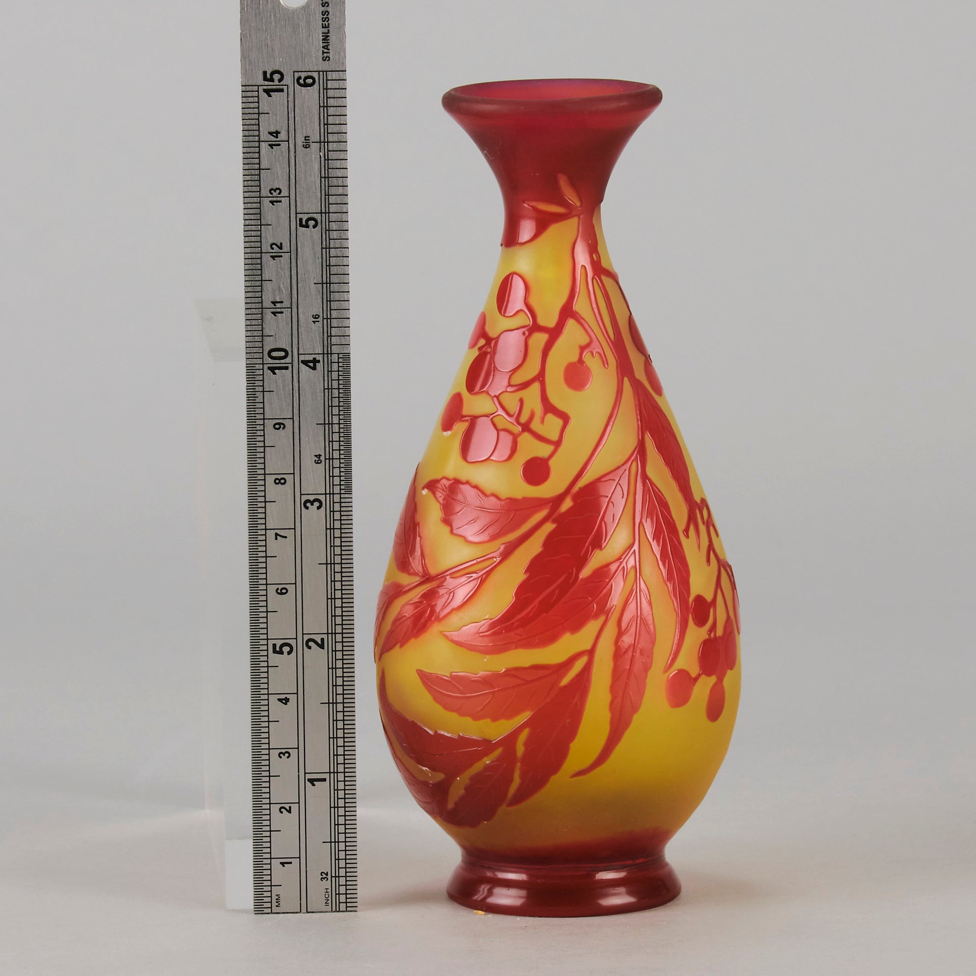 Art Nouveau Glass Vase Red Floral Cabinet Vase by Émile Gallé A beautiful early 20th Century cameo glass vase acid cut and etched with a bright red floral decoration against a warm orange background