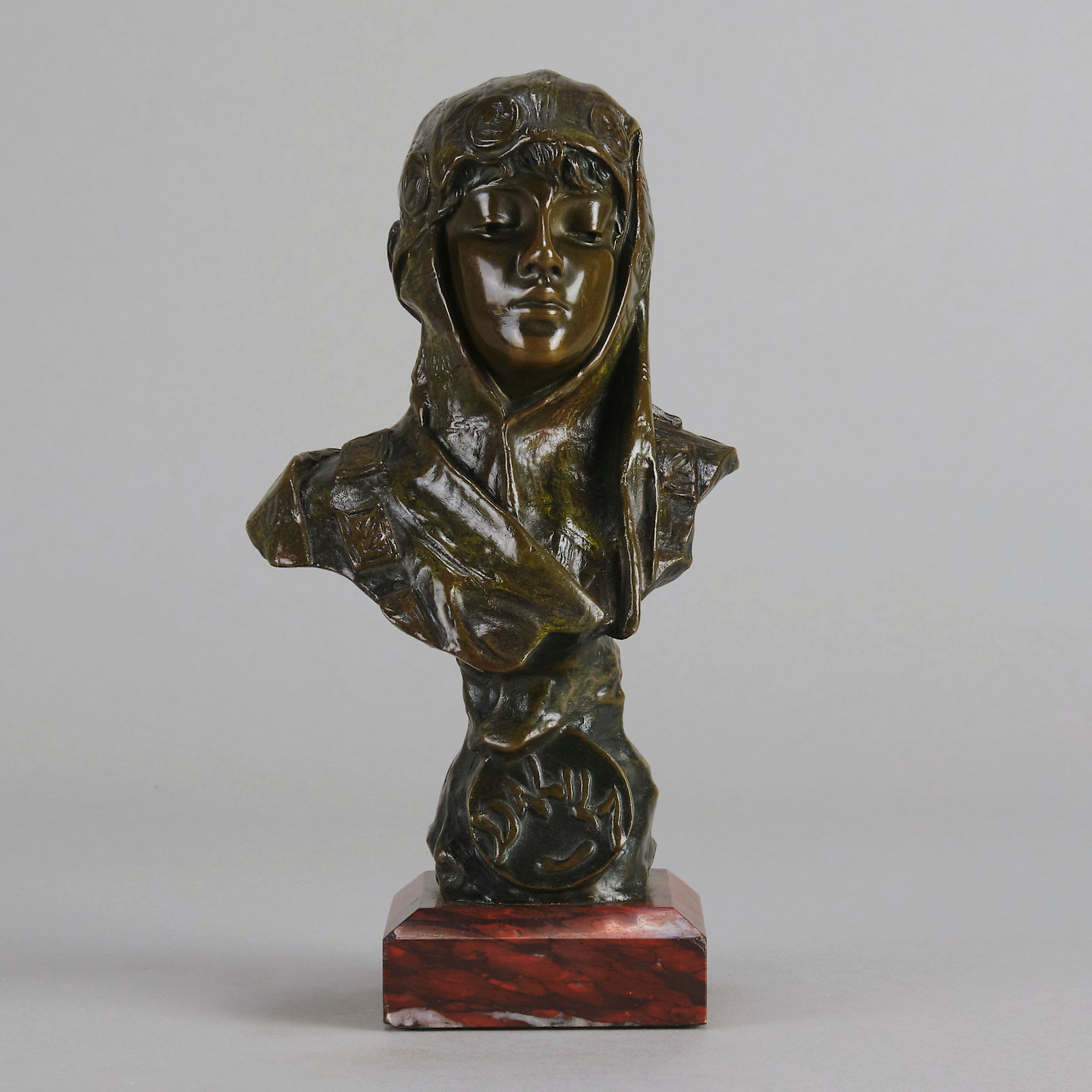 Dalila by Emmanuel Villanis a fantastic depiction of a young Deliah as a bronze bust. Covering her head with a hood