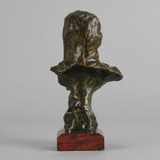 Dalila by Emmanuel Villanis a fantastic depiction of a young Deliah as a bronze bust. Covering her head with a hood