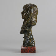 Dalila by Emmanuel Villanis a fantastic depiction of a young Deliah as a bronze bust. Covering her head with a hood