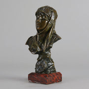 Dalila by Emmanuel Villanis a fantastic depiction of a young Deliah as a bronze bust. Covering her head with a hood