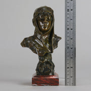 Dalila by Emmanuel Villanis a fantastic depiction of a young Deliah as a bronze bust. Covering her head with a hood