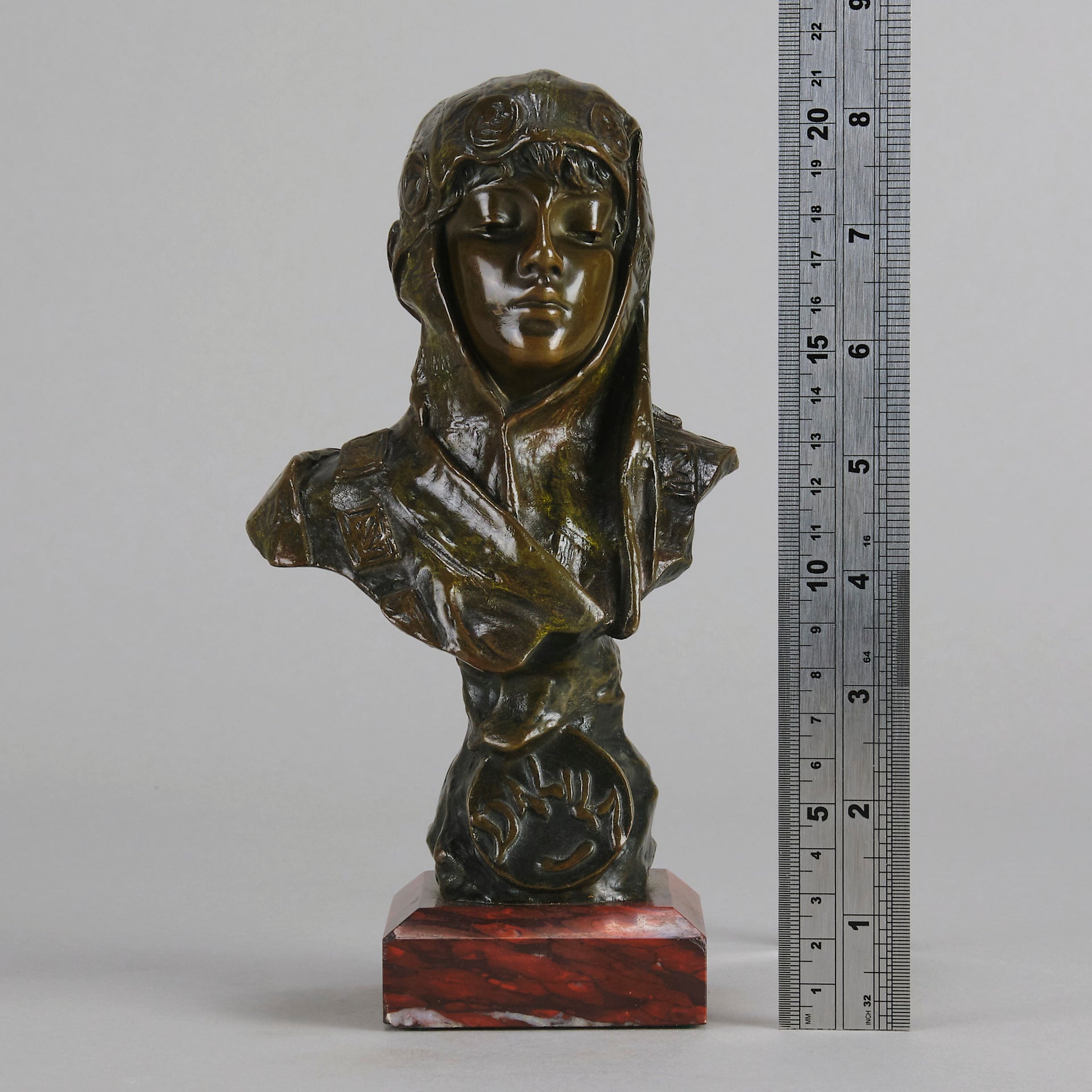 Dalila by Emmanuel Villanis a fantastic depiction of a young Deliah as a bronze bust. Covering her head with a hood