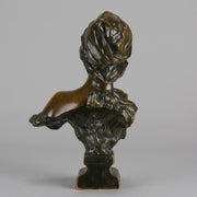 Lola by Emmanuel Villanis a stunning Art Nouveau bronze bust depicting the character "Lola" modelled in the midst of an inquisitive look
