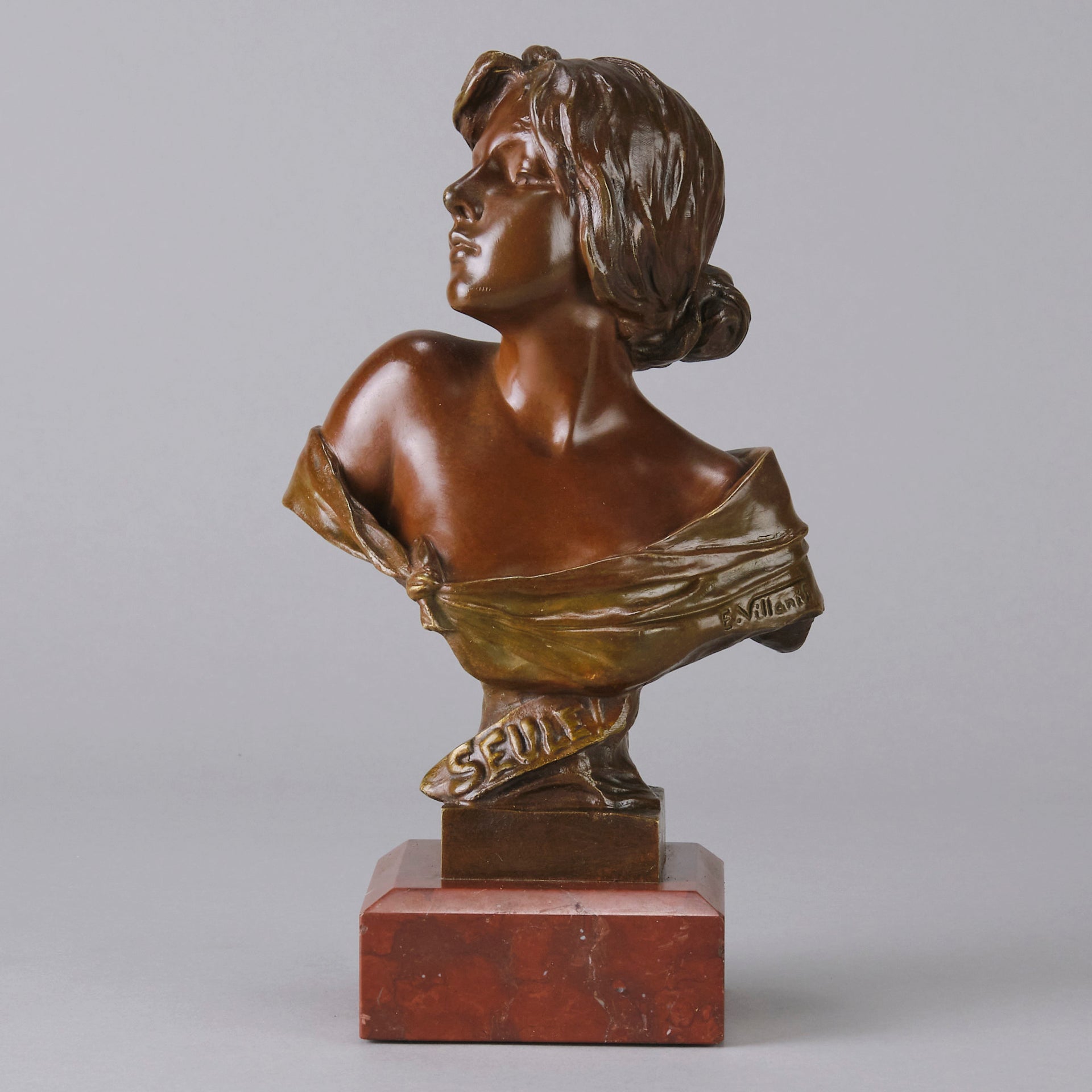 Seule by Emmanuel Villanis a very fine late 19th Century French bronze bust of an attractive classical maiden modelled in the Art Nouveau style, with fabulous variegating red and brown colour