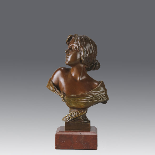 Seule by Emmanuel Villanis a very fine late 19th Century French bronze bust of an attractive classical maiden modelled in the Art Nouveau style, with fabulous variegating red and brown colour
