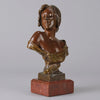 Seule by Emmanuel Villanis a very fine late 19th Century French bronze bust of an attractive classical maiden modelled in the Art Nouveau style, with fabulous variegating red and brown colour