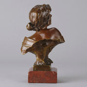 Seule by Emmanuel Villanis a very fine late 19th Century French bronze bust of an attractive classical maiden modelled in the Art Nouveau style, with fabulous variegating red and brown colour