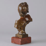 Seule by Emmanuel Villanis a very fine late 19th Century French bronze bust of an attractive classical maiden modelled in the Art Nouveau style, with fabulous variegating red and brown colour