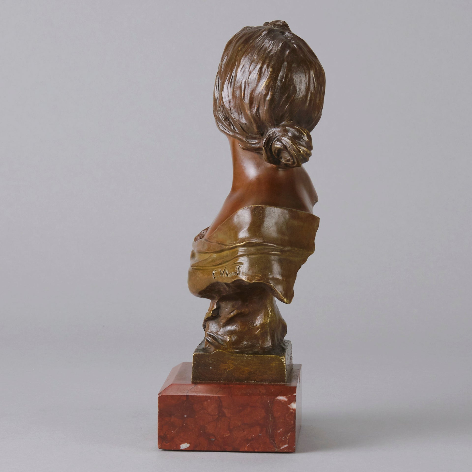 Seule by Emmanuel Villanis a very fine late 19th Century French bronze bust of an attractive classical maiden modelled in the Art Nouveau style, with fabulous variegating red and brown colour
