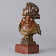 Seule by Emmanuel Villanis a very fine late 19th Century French bronze bust of an attractive classical maiden modelled in the Art Nouveau style, with fabulous variegating red and brown colour