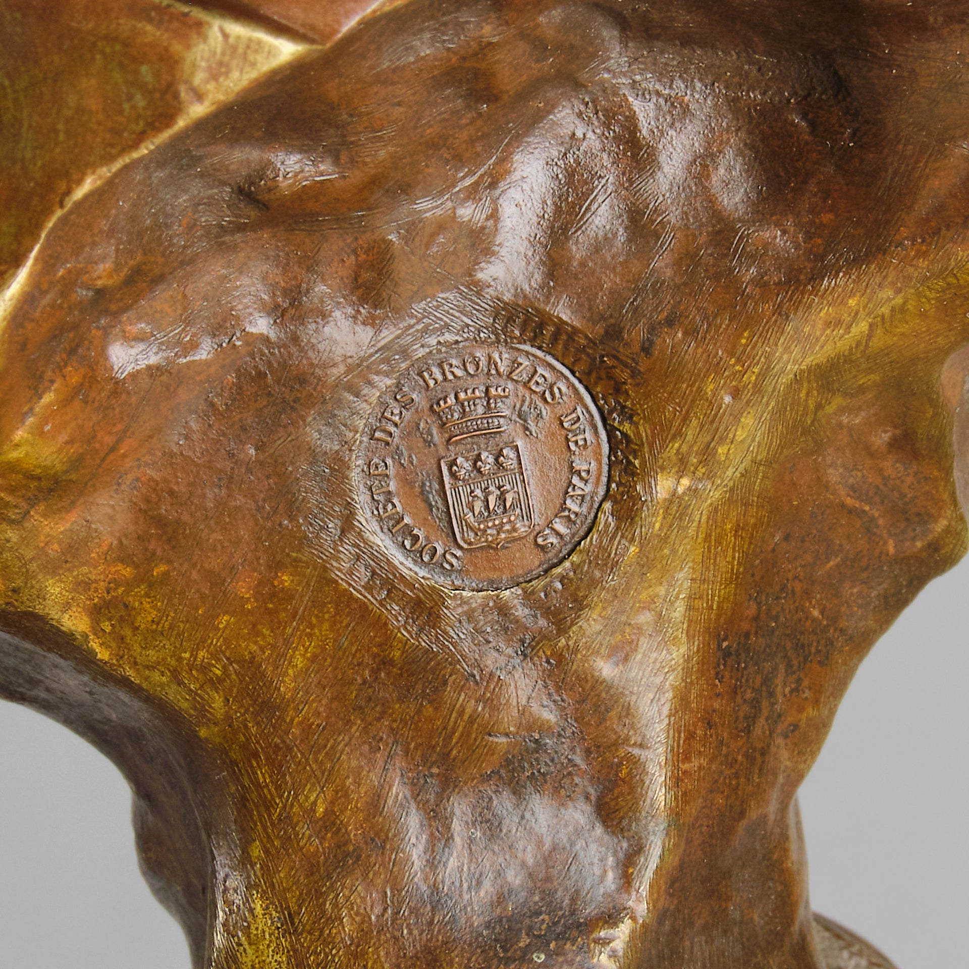 Seule by Emmanuel Villanis a very fine late 19th Century French bronze bust of an attractive classical maiden modelled in the Art Nouveau style, with fabulous variegating red and brown colour