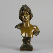 Silvia by Emmanuel Villanis a very fine late 19th Century French bronze bust of an attractive classical maiden modelled in the Art Nouveau style, with fabulous multi hued patination of brown and a subtle green